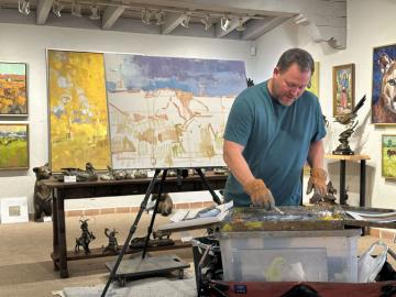 Anton nowels  mixing colors for demo at mtg for chamber